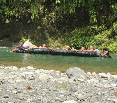 Rafting back to the village after a trek